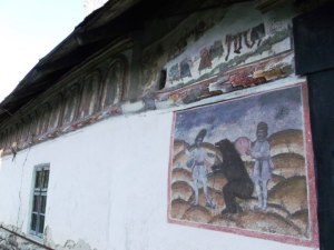 Peretele cu Jocul Ursarilor de pe bisericuţa din Olari. Foto: Călin Hera